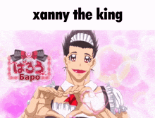a man in a maid outfit making a heart with his hands
