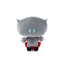 a stuffed animal with the letter t on the back of it