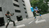 two robots are fighting in a parking lot and one has a blue balloon in his hand