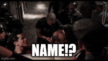 a man in a police uniform is asking for his last name