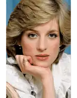 a woman with a ring on her finger rests her head on her hand