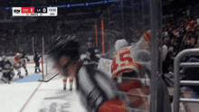 a hockey game is being played and the score is 0 to 3