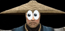 a man wearing a straw hat with cartoon eyes on his face
