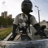 a person wearing a helmet that says gives you wings on it