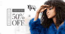 a woman wearing a blue fur coat is standing in front of a sign that says 50 % off