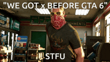 a man wearing sunglasses and a bandana is standing in a store with the words " we got x before gta 6 "