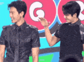 Hyungwon Handshake GIF - Hyungwon Handshake Shownu GIFs