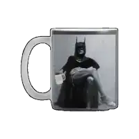 a mug with a picture of a man dressed as batman