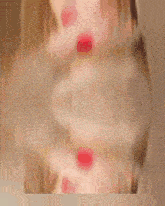 a blurry picture of a woman with the letter e visible