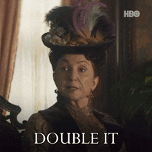 a woman wearing a hat says double it on the screen