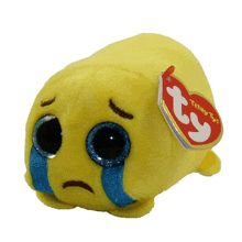 a stuffed animal with a tag that says teeny ty