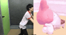 a man in a striped shirt is walking next to a pink stuffed animal .