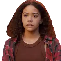 a girl with curly hair is wearing a plaid shirt