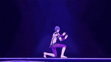 a man in purple pants is kneeling on a stage in front of a purple light .