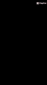 a close up of a person 's face with sparks coming out of it and the caption capcut