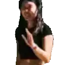 a woman is standing with her hands folded in front of her face .