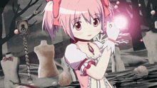 a girl with pink hair and a white glove holds a pink object in her hand