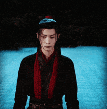 a man with a red scarf around his neck