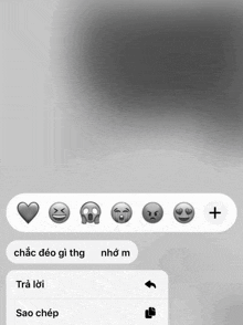 a screenshot of a text message with a heart smiley face angry face and sad face