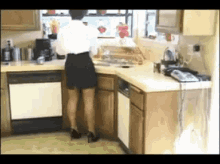 Woman In Kitchen Chores GIF - Woman In Kitchen Chores Dishes GIFs
