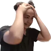 a man in a black shirt holds his head in his hands