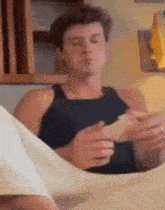 Shawn Mendes Reaction Shawn Mendes Eating And Sitting GIF - Shawn Mendes Reaction Shawn Mendes Shawn Mendes Eating And Sitting GIFs