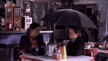 Gilmore Girls Umbrella GIF - Gilmore Girls Umbrella Rain GIFs