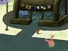 a cartoon of patrick and spongebob in front of a fish tank