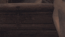 a close up of a person 's face in a video game with a dark background .