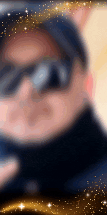 a blurry picture of a person wearing a mask and sunglasses