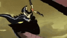 a person is riding on the back of a black dragon .