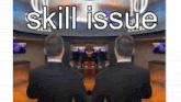 a man in a suit is standing in front of a wall that says skill issue
