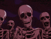 a group of skeletons are dancing in a dark room