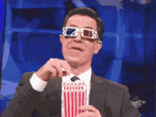 Stephen Colbert Popcorn Munching GIF - Popcorn Watching Eating GIFs