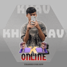 a man taking a picture of himself in front of a logo that says kh au online