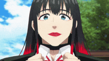 a girl with black hair and red highlights is wearing a choker