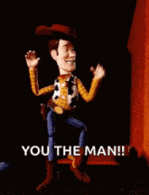woody from toy story is standing in front of a door and pointing