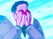 a man covering his face with his hands with blood coming out of his nose