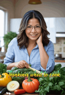 a woman is smiling in front of vegetables with the words thinking what to cook above her