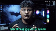 a man wearing glasses and a black shirt with the words mere dimaag khali hai ek number