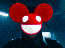 a man wearing a red mickey mouse mask with the words i 'm deadmau5 below him
