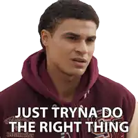 a man wearing a maroon hoodie with the words just tryna do the right thing