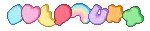 a bunch of colorful hearts are lined up on a white background .