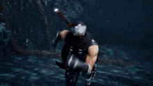 a person is swimming in the water and holding a rope .