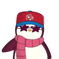 a penguin wearing a hat and scarf with a globe on it