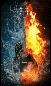 a guitar is surrounded by water and fire