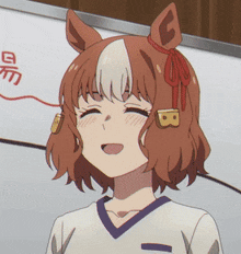 a girl with a horse ear and a letter b on her head