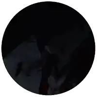 a man wearing a red hat and a mask is in a circle