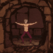 a man without a shirt is standing with his arms outstretched in front of a circle .