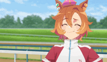 a girl with a crown on her head is wearing a jacket with the letter c on it